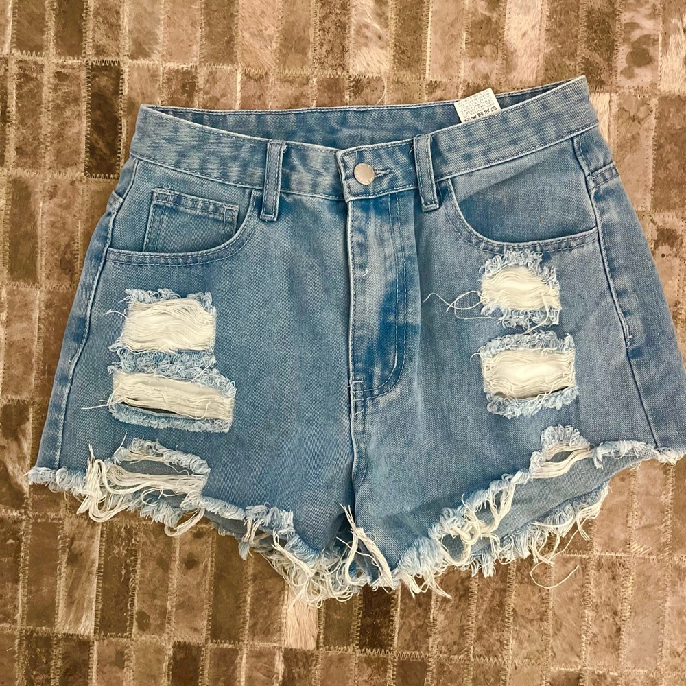 Cut-off Jean shorts for girls (14y)